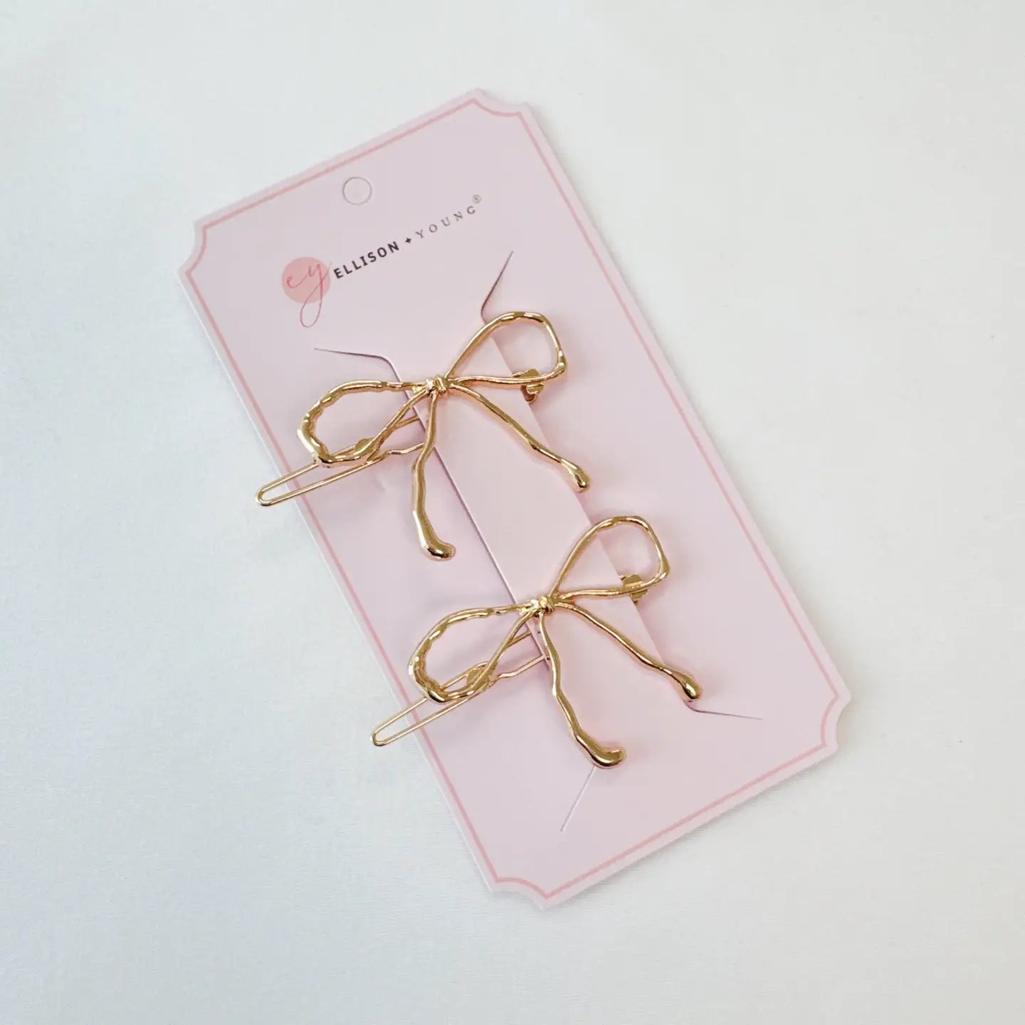Wobbly Gold Metal Bow Hair Clips