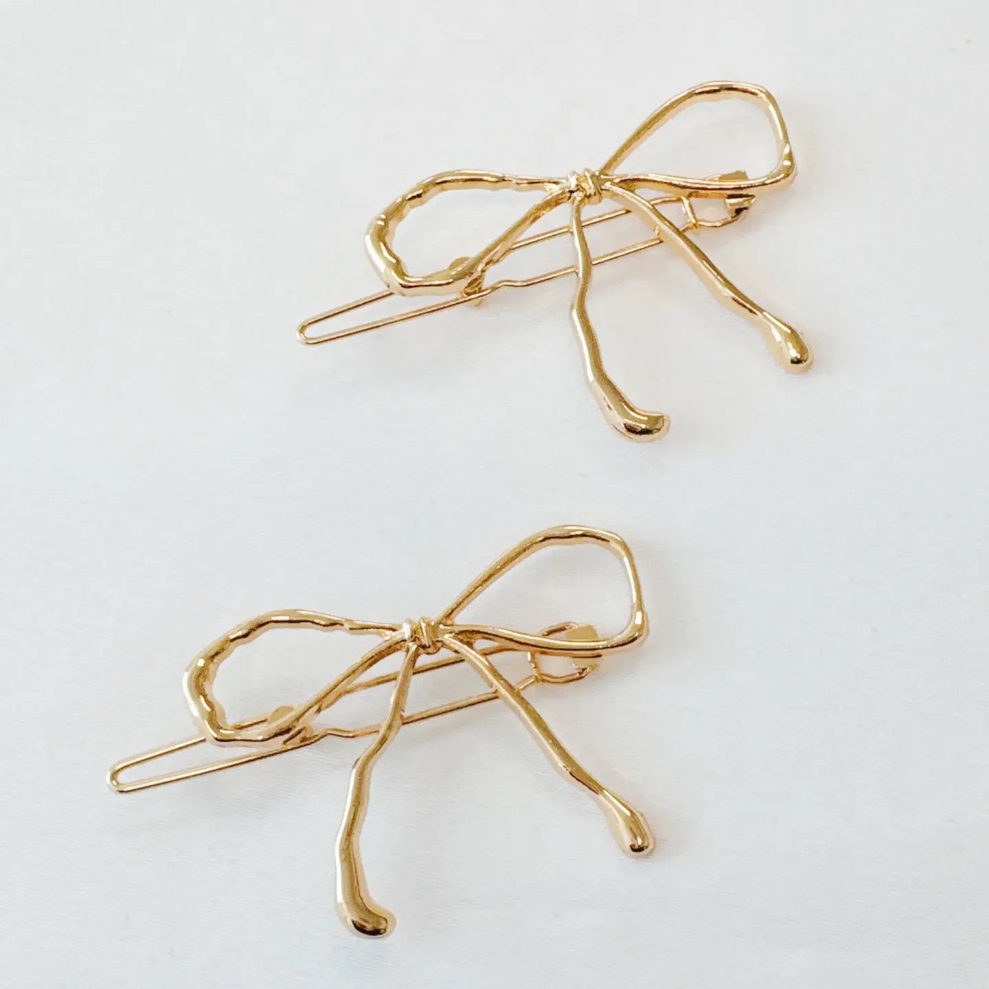 Wobbly Gold Metal Bow Hair Clips